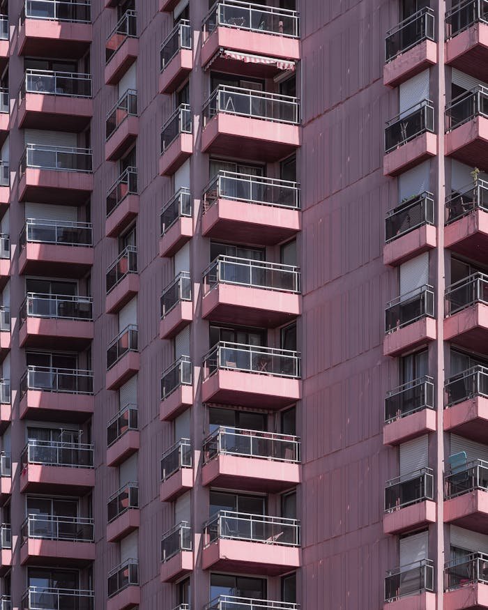 zipwp-image-2188882 Pink High Rise Building
